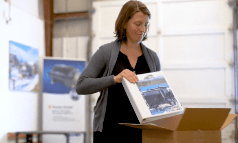 woman shows ring binder