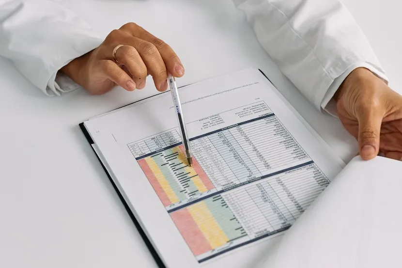 clinical research associate reviewing forms